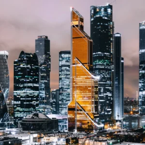 ToF Behang skyline 's avonds met verlichte gebouwen