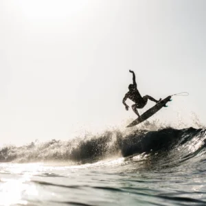 ToF Fotobehang sport surfer pakt een golf